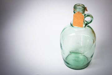 Old light green glass Bottles with paper tag 3