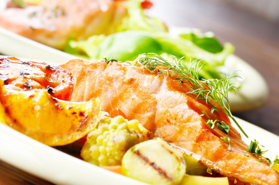 Fried salmon fillet with vegetables