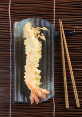 japanese cuisine. tempura prawn on the background
