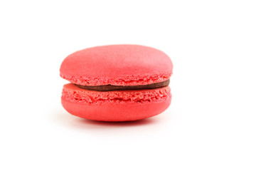 Tasty red macaron isolated on white