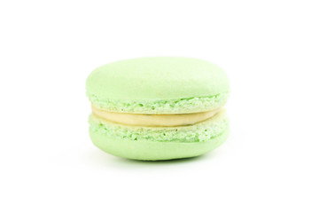 Tasty green macaron isolated on white