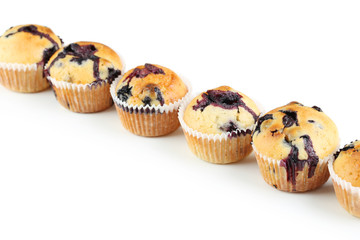 Tasty blueberry muffin isolated on a white