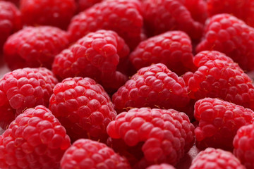 Red raspberry background, close up