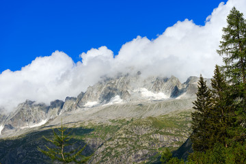 Peak of Care Alto - Adamello Trento Italy. Peak of Care Alto (3462 m) with clouds in the National Park of Adamello Brenta. Trentino Alto Adige, Italy