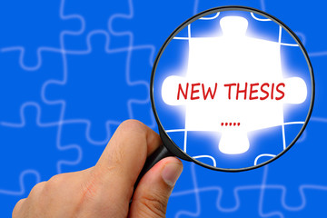NEW THESIS word. Magnifier and puzzles.