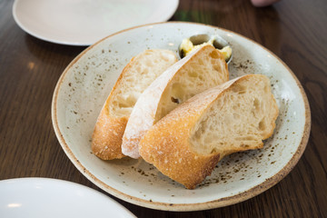 Baguette bread with small butter bow