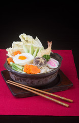 Fototapeta na wymiar japanese cuisine. udon on the background