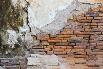 Old weathered brick wall fragment