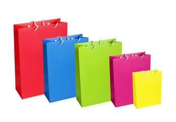 Colourful paper shopping bags isolated on white