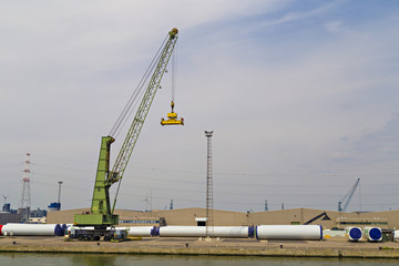 Fototapeta na wymiar Large container cranes in Port of Antwerp, Belgium