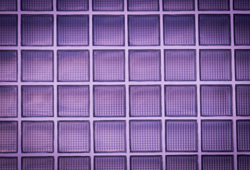 Vignette purple glass block wall background