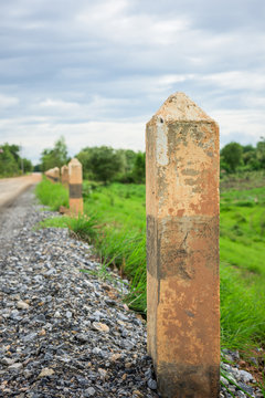 Black and white pole in wayside