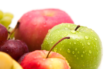 Droplet on green apple fruit, isolate on white background