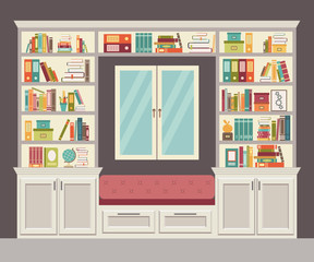 The window seat and wall of books for the home office