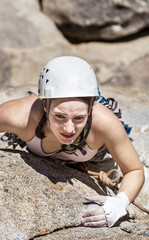 Female climber going for the summit.