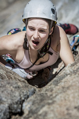 Female climber going for the summit.
