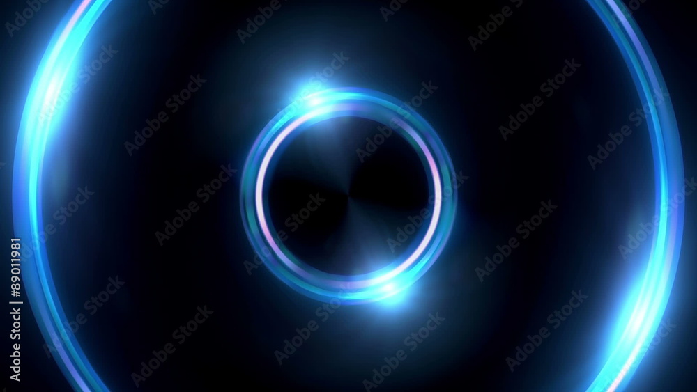 Wall mural the circle shape of ring lens flares is rotating with dark background
