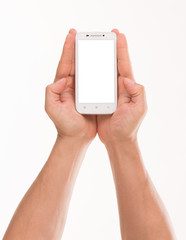 Man's hand holding smart phone