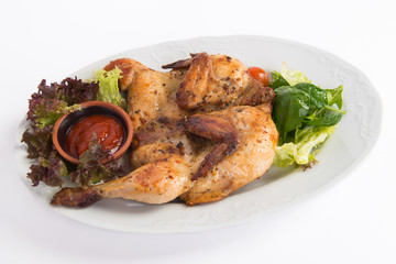 Grilled chicken on the plate with salad