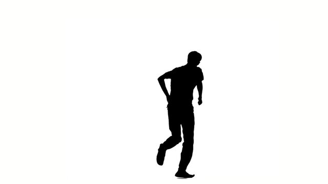 Young, stylish hip-hop man in shirt doing brake dancing