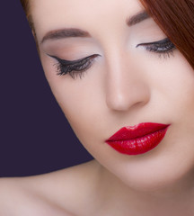 Naklejka premium Gorgeous young woman with long eyelashes. Perfect makeup.