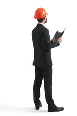 back view of businessman in orange helmet