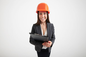 excited woman in orange hardhat