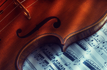 old and rare violin on a note sheet © GIBLEHO