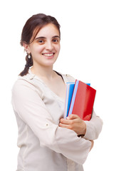 Cute female student looking to the camera, isolated on white bac