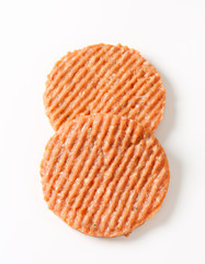 Raw burger patties