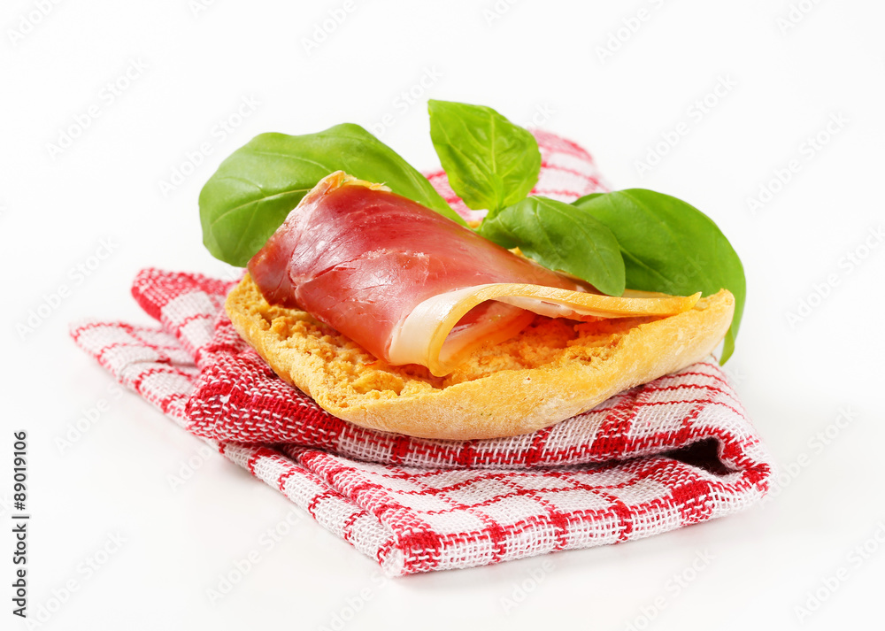 Poster slice of prosciutto on crispy bread