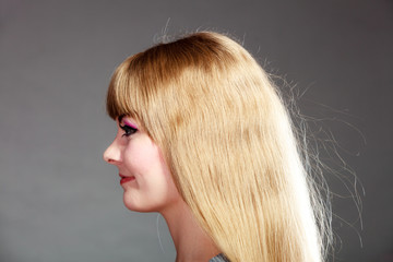 woman face profile with makeup blonde hair