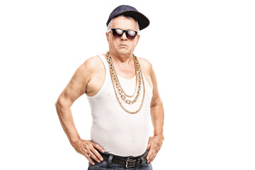 Senior man in hip-hop clothes looking at the camera