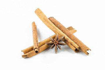 Star anise and cinnamon on white background