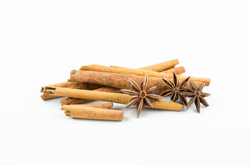 Star anise and cinnamon on white background