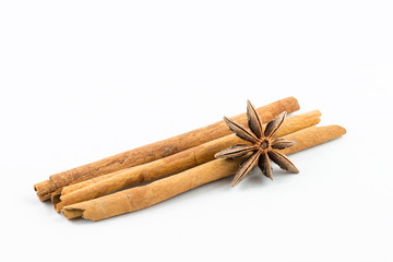 Star anise and cinnamon on white background