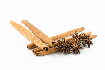 Star anise and cinnamon on white background