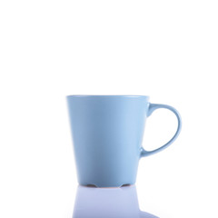 Blue cup on white background