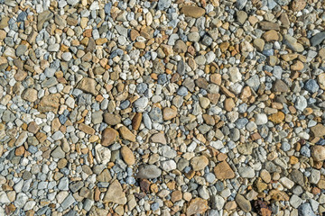 sand texture and stone pieces