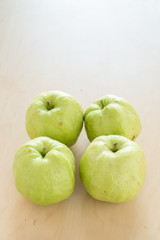 Fresh Natural Green Guava on Wood Table Background