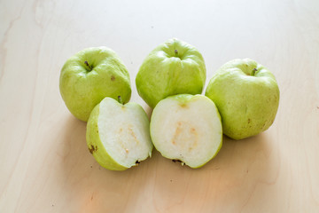 Fresh Natural Green Guava on Wood Table Background