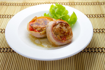 Bacon-wrapped pork