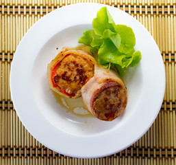 Bacon-wrapped pork