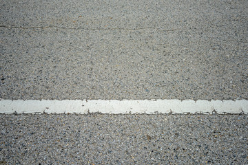 old asphalt texture with white line