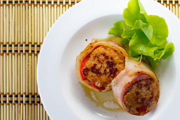 Bacon-wrapped pork