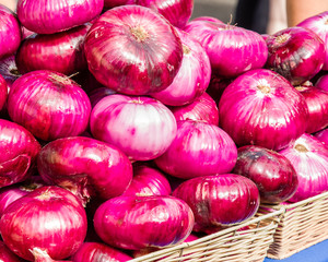 Fresh red onions at the farm market