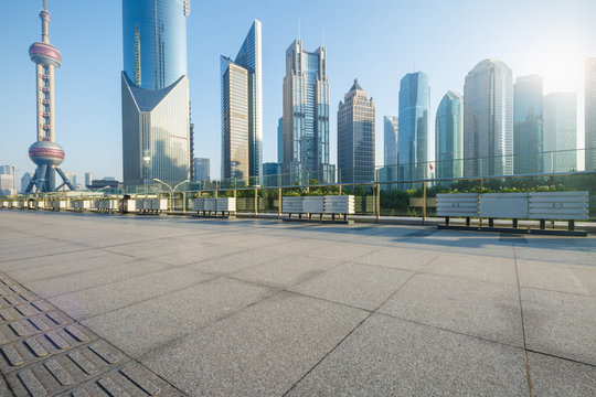 Empty road in front of the modern architecture，in Shanghai, China