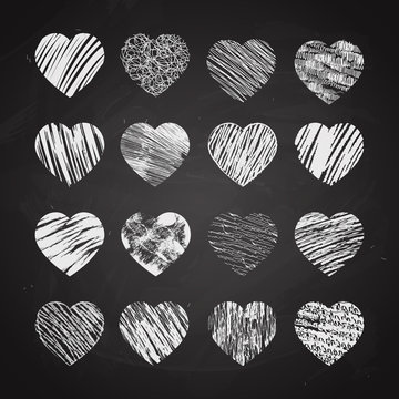 Hand drawn hearts on chalkboard