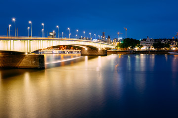 Fototapeta na wymiar Night View Of Deutz Suspension Bridge Over River Rhine, Germany.
