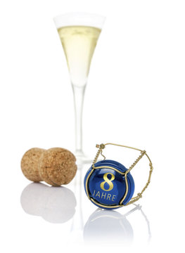 Champagnerdeckel mit der Aufschrift 8 Jahre